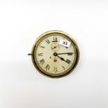 A gilt brass ships style wall clock, Dia. 19cm, understood to be in working order.