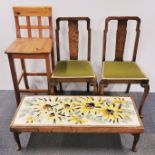 A pine kitchen chair together with a pair of dining chairs and an embroidery topped footstool,