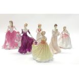 A group of six Royal Doulton porcelain figurines of ladies, tallest H. 25cm.
