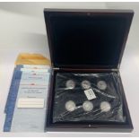 A boxed set of limited edition of 10000 Royal Navy commemorative silver coins.