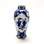 An unusual Chinese hand painted hexagonal porcelain vase with four character mark to base, H. 22cm.