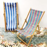 Two vintage folding deck chairs.