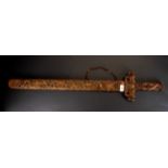 An interesting Chinese sword with wooden blade, L. 98cm.