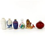 A group of six Chinese porcelain snuff bottles, tallest H. 8.5cm.