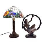 A Tiffany style table lamp, H. 43cm, together with a resin and frosted glass figural table lamp,