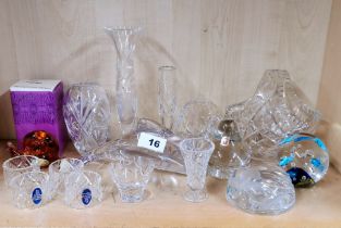 A group of glass paperweights, together with Royal Doulton crystal napkin rings and other items.
