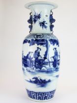 A large Chinese hand painted porcelain vase with liondog handles, H. 59cm.