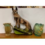 A large 1930's 'chalk' dog figure with two Art Deco ceramic items, dog H. 46cm.