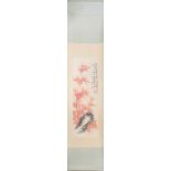 A scroll mounted Chinese ink and watercolour on paper depicting bamboo and rocks, understood to be