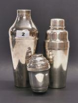 Three vintage silver plated cocktail shakers, largest H. 23cm, medium sized one signed Christofle.