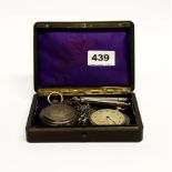 A box containing a .800 outercased silver pocketwatch, a further .800 silver pocketwatch (