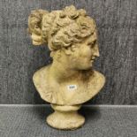 An antique concrete female garden bust, H. 52cm.