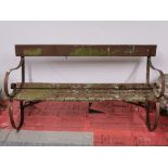 An old wrought iron and wooden garden bench, L. 150cm, H. 79cm.