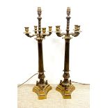 A pair of large antique gilt brass candelabra style table lamps.