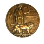 A WWI bronze death plaque for Alfred George Perkins.