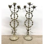 A pair of interesting vintage metal candelabra, H. 66cm.