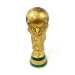 A cast plaster World Cup replica trophy, H. 35cm.