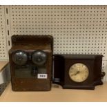 A Farrenti electric Bakelite mantle clock and telephone extension valve.