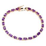 A rose gold on 925 silver bracelet set with oval cut amethysts, L. 18cm.