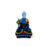 A Chinese painted blue glass figure of a seated Buddha, H. 12cm.