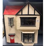 A 1960's dollhouse, H. 62cm.