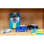 A Corgi toys Hillman Imp, together with a Jaguar XJR-9, two die cast Mini Coopers and three boxed