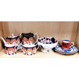 A group of English 19th century porcelain items, decorated in Imari colours, tallest H. 17cm.