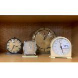 An Art Deco mantle clock and three others.