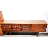 An unusual 1970's Younger teak wood sideboard, 205 x 46 x 72cm.