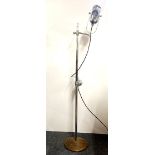 A vintage chromium plated medical lamp, H. 164cm.