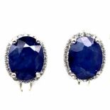 A pair of 925 silver earrings set with oval cut sapphires and white stones, L. 1.2cm.