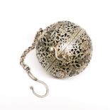 A Chinese pierced white metal (tested silver) incense ball and chain decorated with birds among