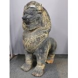 A painted terracotta garden figure of a guardian lion, H. 71cm (A/F to tail and feet).