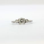 A hallmarked platinum ring set with three large bright brilliant cut diamonds, approx. 1.50ct total,