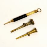 Two antique seal fob pencils and a further gilt metal propelling pencil, longest as shown 7cm.