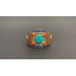 A Tibetan white metal stone set Kampa Tribe hinged bangle. W. 5.5cm, internal Dia. 6.2cm.