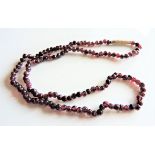 Vintage Garnet Bead Necklace. A fine and very elegant string of natural garnet beads that are rich