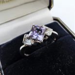 Sterling Silver Gemstone Ring.. A lovely sterling silver ring set with a 6mm lilac gemstone with a