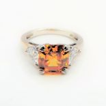 Sterling Silver Citrine Ring . A sterling silver ring set with a central Lab created Citrine with