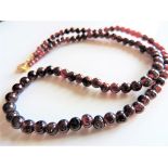 Vintage Garnet Bead Necklace. A fine and very elegant string of natural garnet beads that are rich