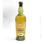 A vintage bottle of Chartreuse licqeur.
