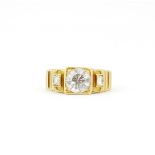 A gent's 18ct yellow gold ring set with a large diamond, approx. 2ct, with diamond set shoulders, (