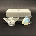A boxed Lalique crystal figure of two doves, H. 4cm, together with a Lalique crystal glass fish.