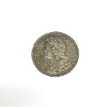 A King George II 1728 silver sixpence, in good condition.