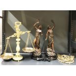 Two French spelter Art Nouveau figures, H. 46cm, together with an onyx and gilt metal balancing