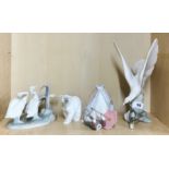 Two Lladro figurines of birds, H. 28cm, a Lladro polar bear and a Lladro figure of a girl with a
