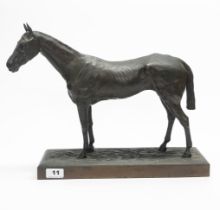 An early 20th century cast bronze figure of a racehorse, after D. E. Devains, H. 34cm.