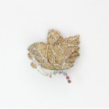 A 925 silver butterfly brooch set with yellow sapphires, emeralds and rubies, L. 4cm.