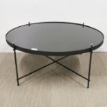 A Zuiver plate glass topped metal coffee table, Dia. 81cm H. 33cm.