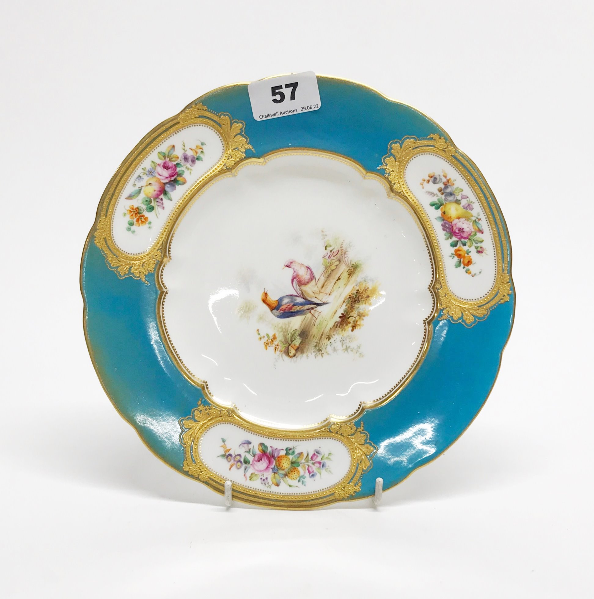 An early 19th century Sevres style hand painted and gilt porcelain plate, Dia. 24cm.